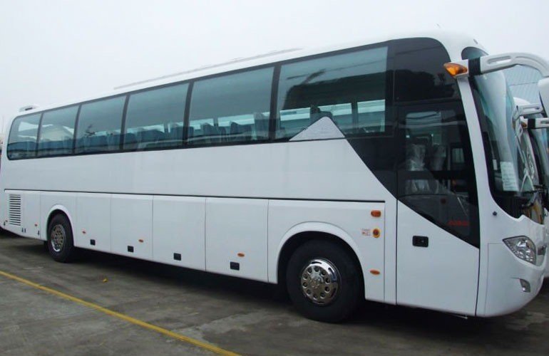 Minibus rental in Paris with a professional chauffeur for group transportation.