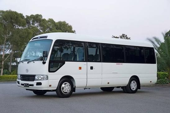 Minibus rental in Paris with a professional chauffeur for group transportation.
